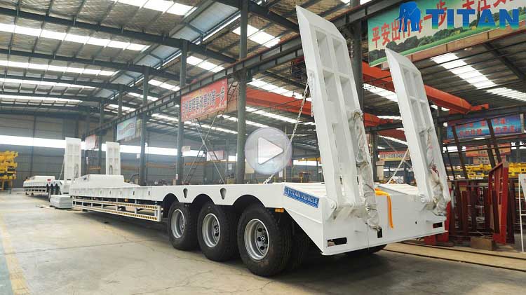 https://www.chinatrucktrailers.com/video/tri-axle-drop-deck-trailer-for-sale.html